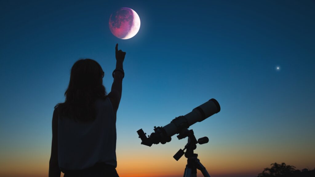 Exploring your own shadow side girl with telescope and lunar eclipse