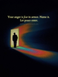 A lone silhouette steps through a bright doorway framed by surrounding darkness, embodying the quiet courage of moving from shadow into light. Your anger is fear in armor. Name it.