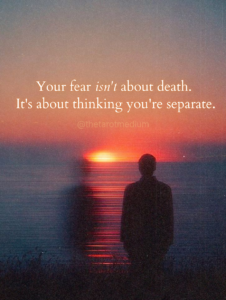 Two human figures at ocean sunset, one solid light and one translucent, representing the illusion of separation and fear of death