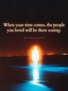 Illuminated human silhouette standing on beach at night with warm light and cool water reflection representing soul reuniting with loved ones after death