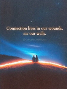 We meet in the broken places, not the polished ones. Two silhouettes on swings under a faint moon, one made of stars and one of darkness, representing soulmate connections through vulnerability explained by a psychic medium and tarot reader.