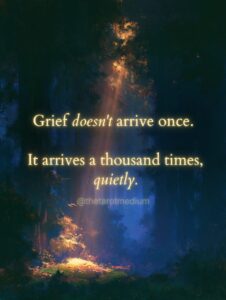 A shaft of golden light striking a small patch of moss on a dark forest floor, with the quote "Grief doesn't arrive once. It arrives a thousand times, quietly." From The Tarot Medium on why grief hurts all over again every time you remember.